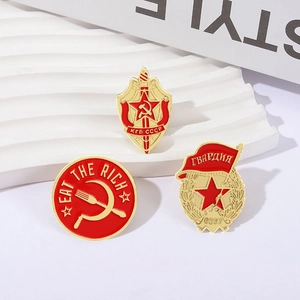 Soviet KGB shield and sword enamel brooches with CCCP military star insignias