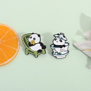 Cute panda enamel pin set featuring panda in bamboo chair and tea cup accessories