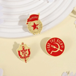 Detailed collection of Soviet KGB shield badges and Guard pins on a display stand