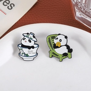 Cute panda enamel pin set with bamboo chair and tea cup featuring Enjoy Tea Time text