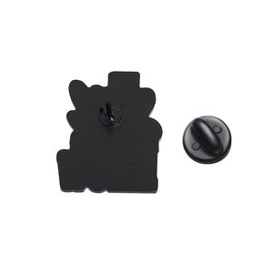 Detailed back view of matte black metal brooch with rubber butterfly clutch fastener
