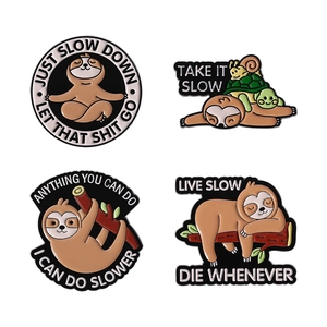 Set of 4 cute sloth enamel pins featuring funny slow life slogans on white background