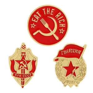 Three Soviet-themed enamel pins featuring KGB medals and red star wheat flag designs