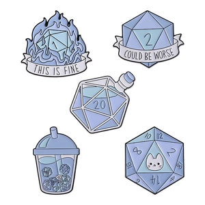 Five-piece blue enamel pin set featuring D20 dice designs with comic-style captions