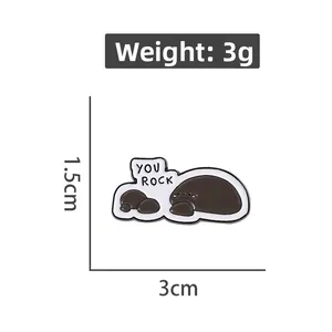 Detailed view of You Rock enamel pin featuring cute stone characters with 3cm size specs