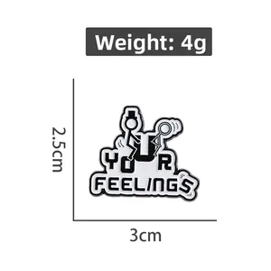 Detail view of Your Feelings enamel pin with dimensions 2.5cm by 3cm and 4g weight