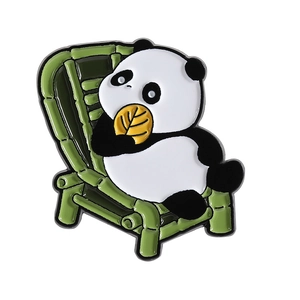 Cute enamel panda brooch sitting on a bamboo chair crafted with high-quality metal finish