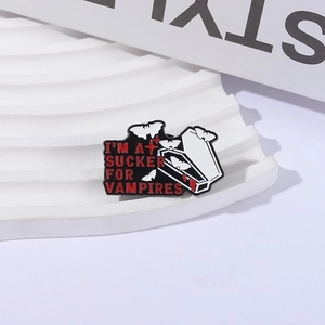 Vampire enamel pin with coffin and bat design and I'm a sucker for vampires text