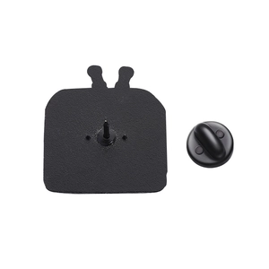 Close-up of the matte black panda enamel pin back and secure rubber clutch backing