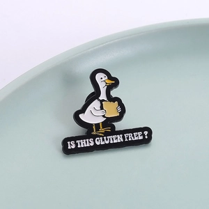 Cute cartoon goose enamel pin with toast and Is This Gluten Free letter badge