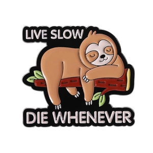 Cartoon sloth enamel pin with Live Slow Die Whenever slogan on white background
