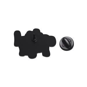 Detail of the black matte enamel pin back featuring a secure rubber clutch fastener
