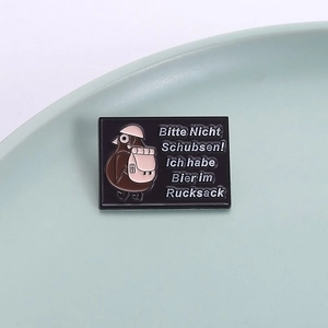 Cartoon bird enamel pin with German text Please Don't Push I Have Beer in My Backpack