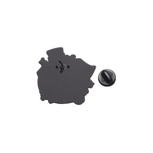 Detail view of the black metal badge back with a secure rubber clutch fastener