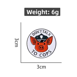 Detail view of 3cm enamel pig sheriff badge with Don't Talk To Cops text and 6g weight