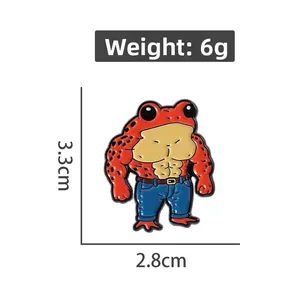 Detailed view of muscle frog enamel pin with dimensions 3.3cm x 2.8cm and 6g weight
