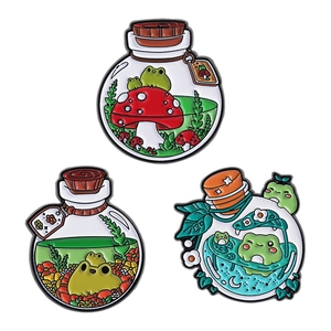 Set of 3 cartoon frog and mushroom enamel pins in glass jar designs for accessories