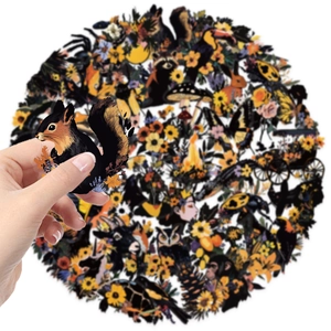 Detailed view of hand-held squirrel sticker from waterproof floral and animal set