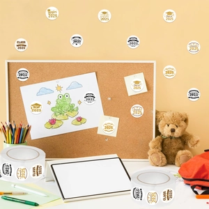 Class of 2025 graduation stickers applied to surfaces for school memory scrapbooking