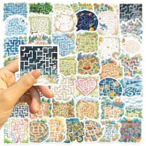 Detailed view of waterproof cartoon maze stickers being held to show size and vibrant colors