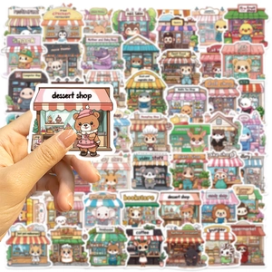 Close-up of cute cartoon animal shop stickers for DIY decor on laptops and guitars