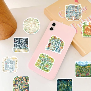 Detail of colorful maze cartoon stickers applied on a pink phone case for DIY decoration