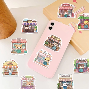 Close-up of cute cartoon shop stickers applied to a pink phone case for decoration
