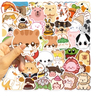 Close-up of hand holding a cute cartoon animal sticker from the 50-piece colorful set