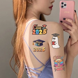 Class of 2025 waterproof graduation tattoos featuring cute ghosts on a person shoulder