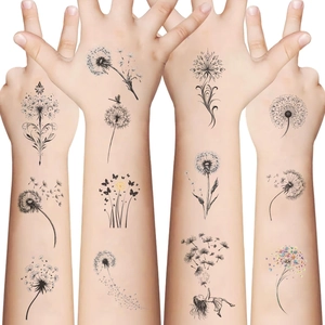 Tatouages temporaires pissenlit imperméables avec motifs papillons sur le bras