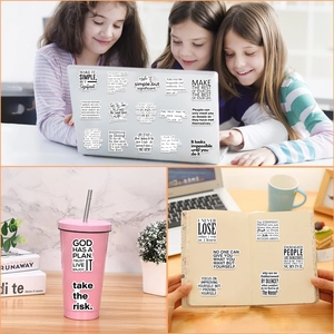 Detailed usage of black and white inspirational quote stickers on water bottles and journals
