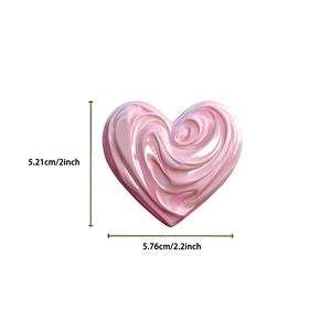 Detailed view of pink heart sticker showing size 2x2.2 inch for laptop and DIY decor