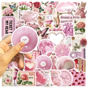 Close-up of pink aesthetic waterproof stickers featuring vintage cat and flower patterns