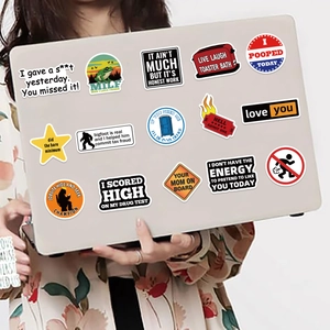 Funny meme prank stickers on a laptop featuring sarcastic quotes and diverse waterproof designs