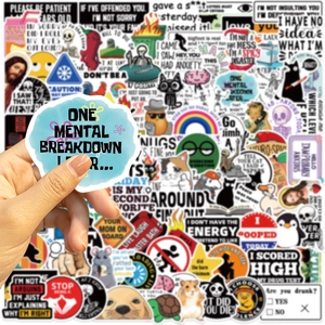 Close-up of waterproof vinyl prank meme stickers for laptop and guitar decoration