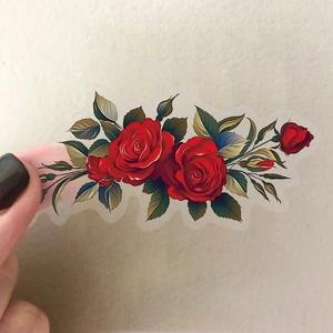 Close-up of vintage red rose PET stickers with transparent edges for scrapbooking decor