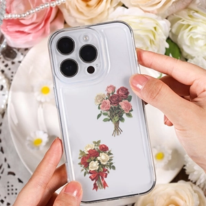 Close-up of vintage rose flower stickers applied to a transparent iPhone protective case