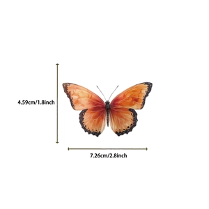 Vue détaillée d'un autocollant papillon vintage avec dimensions 7,26 cm de large et 4,59 cm