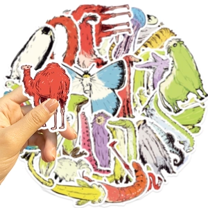 Close-up of waterproof cartoon animal stickers for guitar and laptop decoration