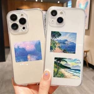 Detailed shot of transparent iPhone cases featuring impressionist oil painting designs