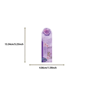 Detailed view of floral paper bookmarks with purple roses and blue butterflies patterns