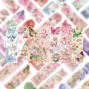 Detail of 7 vintage butterfly bookmarks featuring floral motifs and retro paper texture