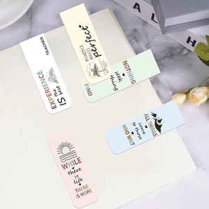Detailed view of 5-piece magnetic bookmarks with inspirational quotes and simple illustrations