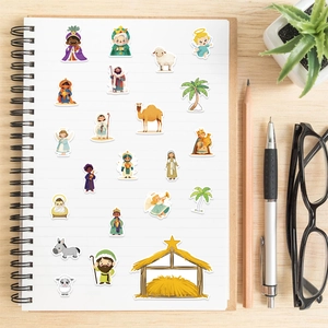 Close-up of cute cartoon nativity stickers for kids featuring Mary, Joseph, and baby Jesus