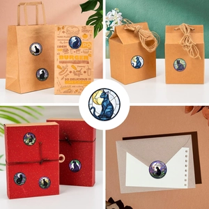 Detailed view of stained glass style cat stickers applied to envelopes and gift boxes