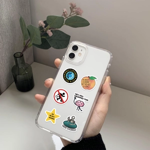 Close-up of clear phone case with American humor stickers and meme designs