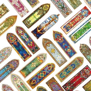 Macro shot of assorted gothic stained glass window stickers with vibrant floral patterns