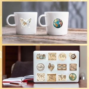 Retro map stickers on white mug and laptop showing waterproof vintage aesthetic designs