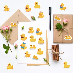 Roll of 500 cute yellow duck cartoon stickers for scrapbooking and envelope sealing