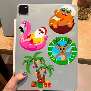 Autocollants de Noël hawaïens étanches montrant le Père Noël sur flamant rose sur iPad